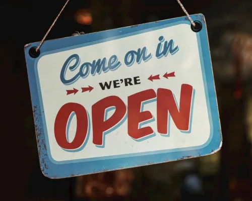 Store Sign that Says 'Come On In, We're Open'